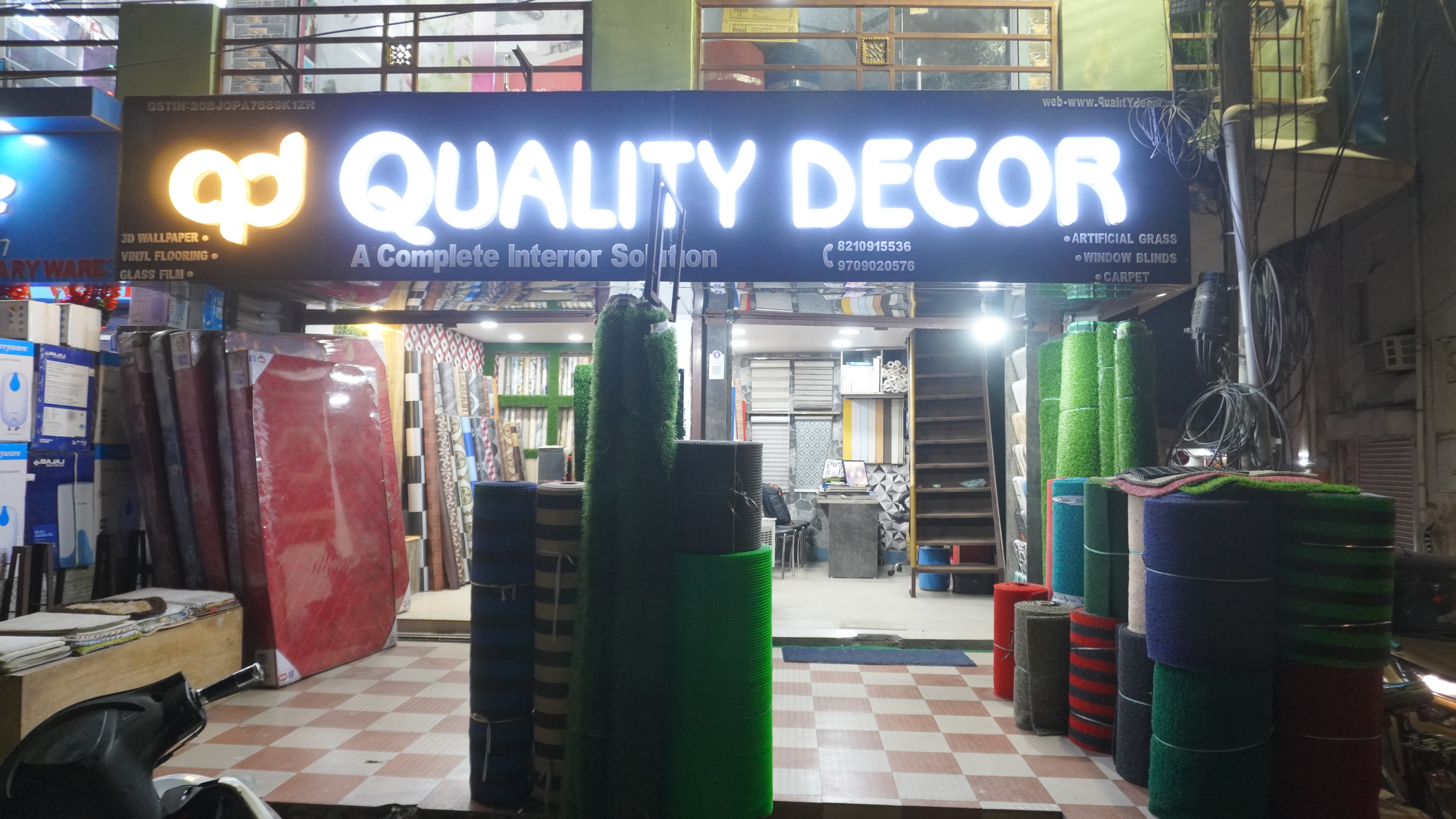 Quality Decor showroom at night